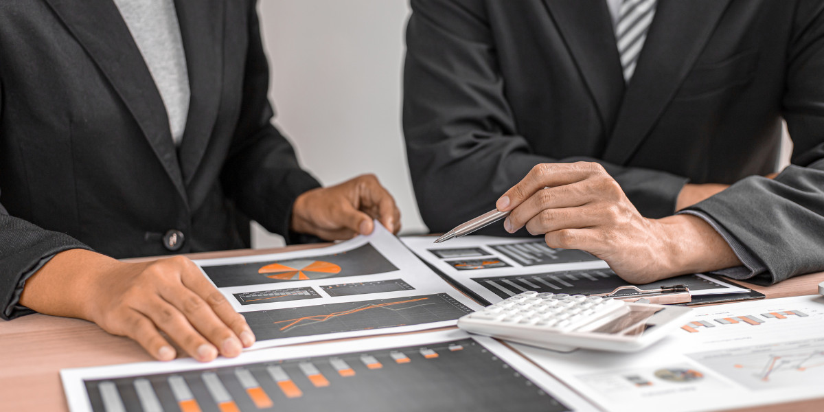 Business team analyzing financial charts